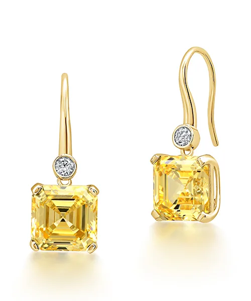 Yellow sapphire gold earrings with diamond accent, retouched image